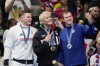 Gold medalist, Nicolo Martinenghi, center, of Italy, stands with silver medalists, Nic Fink, right, of the the United States, and Adam Peaty, of Britain, on the podium after the men's 100-meter breaststroke final at the 2024 Summer Olympics, Sunday, July 28, 2024, in Nanterre, France. (AP Photo/Bernat Armangue)