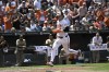 Baltimore Orioles' Gunnar Henderson scores on a single by Ryan Mountcastle off San Diego Padres pitcher Randy Vásquez during the third inning of a baseball game, Sunday, July 28, 2024, in Baltimore. (AP Photo/Terrance Williams)