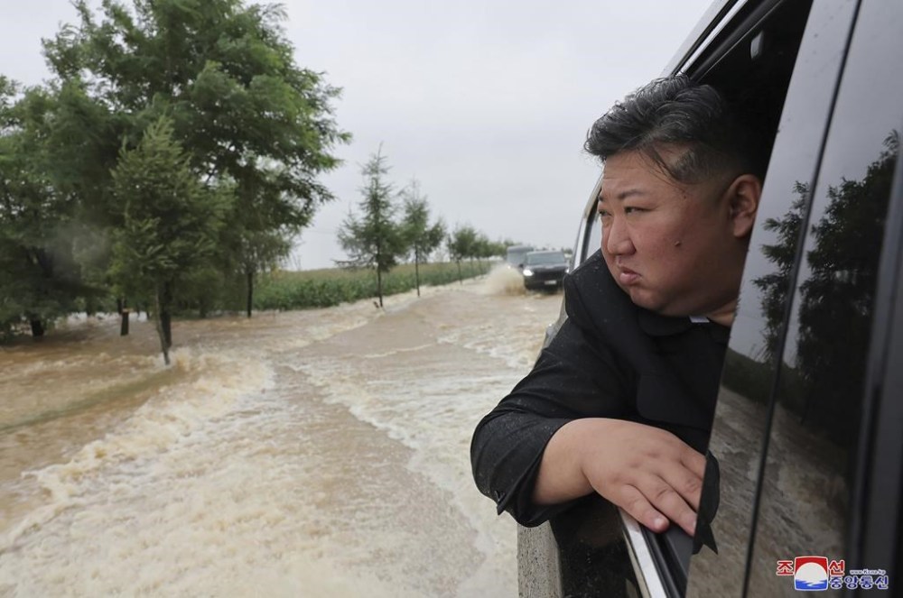 In this photo provided by the North Korean government, North Korean leader Kim Jong Un inspects a flood-hit area in North Phyongan province, North Korea Sunday, July 28, 2024. Independent journalists were not given access to cover the event depicted in this image distributed by the North Korean government. The content of this image is as provided and cannot be independently verified. Korean language watermark on image as provided by source reads: