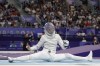 United States' Magda Skarbonkiewicz competes with Turkey's Nisanur Erbil in the women's individual Sabre round of 32 competition during the 2024 Summer Olympics at the Grand Palais, Monday, July 29, 2024, in Paris, France. (AP Photo/Andrew Medichini)