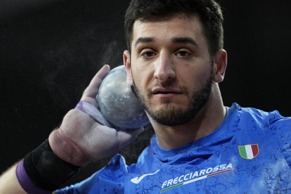 FILE - Leonardo Fabbri, of Italy, makes an attempt in the men's shot put during the World Athletics Indoor Championships at the Emirates Arena in Glasgow, Scotland, March 1, 2024. (AP Photo/Bernat Armangue, File)