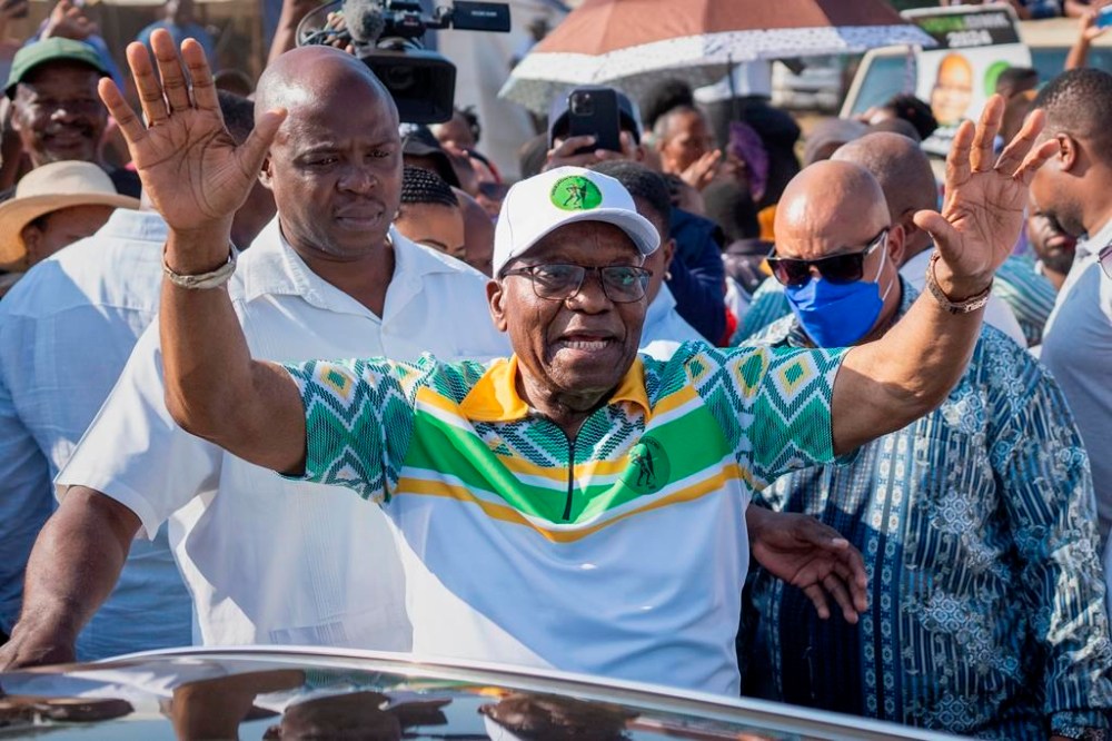 FILE - Former president of the A.N.C. and South Africa, Jacob Zuma, waves to supporters after casting his ballot in Nkandla, Kwazulu Natal, South Africa, Wednesday, May 29, 2024 during the general elections. The African National Congress (ANC) announced Monday, July 29, 2024 that Zuma has been expelled from the ANC. (AP Photo/Emilio Morenatti, File)