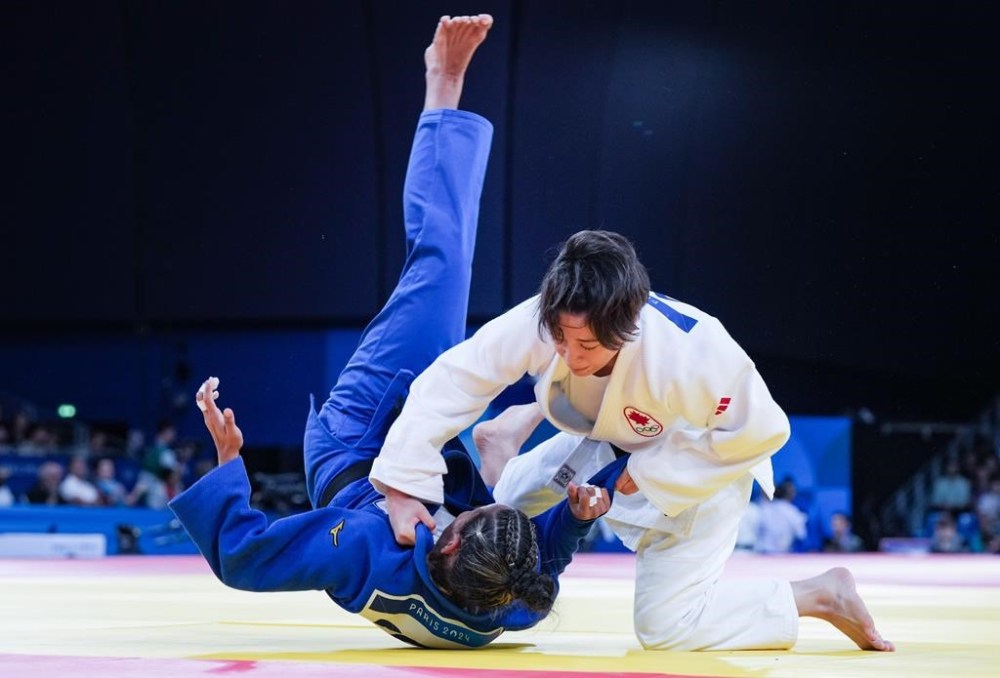 Canada's Christa Deguchi competes against Panama's Kristine Jimenez in women's -57kg judo in Paris, France on Monday, July 29, 2024. THE CANADIAN PRESS/Christinne Muschi