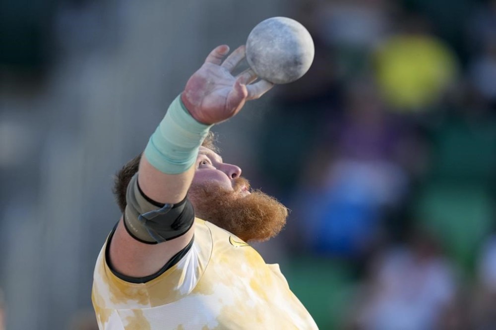 FILE - Ryan Crouser competes in the men's shot put final during the U.S. Track and Field Olympic Team Trials Saturday, June 22, 2024, in Eugene, Ore. (AP Photo/Charlie Neibergal, File)