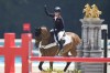 Britain's Laura Collett, riding London 52, celebrates after winning the gold medal in the equestrian jumping teams competition at the 2024 Summer Olympics, Monday, July 29, 2024, in Versailles, France. (AP Photo/Mosa'ab Elshamy)