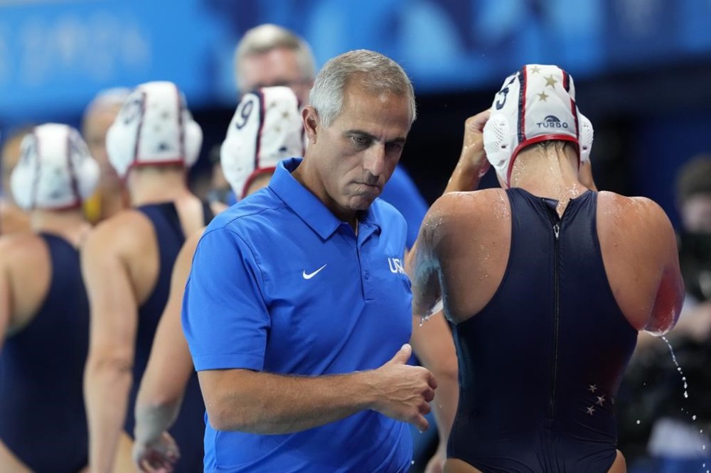 United States' head coach Adam Krikorian leaves after a women's water polo Group B preliminary match between USA and Spain at the 2024 Summer Olympics, Monday, July 29, 2024, in Saint-Denis, France. (AP Photo/Luca Bruno)