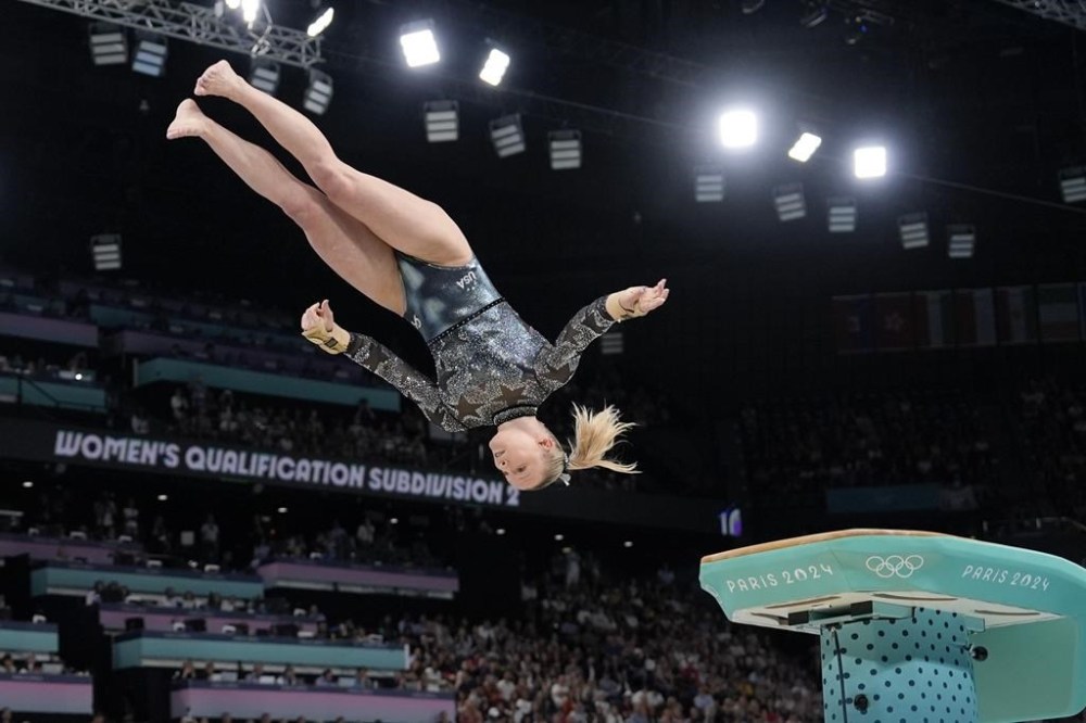 Jade Carey, of United States, competes on the vault during a women's artistic gymnastics qualification round at Bercy Arena at the 2024 Summer Olympics, Sunday, July 28, 2024, in Paris, France. (AP Photo/Charlie Riedel)