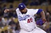 FILE - Los Angeles Dodgers relief pitcher Reyes Moronta throws to the plate during the ninth inning of a baseball game against the San Francisco Giants, May 4, 2022, in Los Angeles. Moronta died on July 28, 2024, in a traffic accident in his native province of Santiago, Dominican Republic, according to his former Dominican team the Águilas Cibaeñas. (AP Photo/Mark J. Terrill, File)