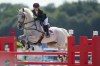 CORRECTS FAMILY NAME Morocco's Noor Slaoui riding Cash In Hand, competes in the Equestrian Jumping, at the 2024 Summer Olympics, Monday, July 29, 2024, in Versailles, France. (AP Photo/Mosa'ab Elshamy)