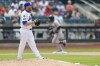 New York Mets relief pitcher Jake Diekman stares into the outfield as Atlanta Braves' Ramón Laureano rounds third base after hitting a two-run home run in the eighth inning of a baseball game Sunday, July 28, 2024, in New York. (AP Photo/Rich Schultz)