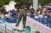Rayssa Leal, of Brazil, executes a trick on the rail during the women's skateboard street final at the 2024 Summer Olympics, Sunday, July 28, 2024, in Paris, France. (AP Photo/Frank Franklin II)