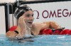 Summer McIntosh, of Canada, celebrates after winning the women's 400-meter individual medley final at the 2024 Summer Olympics, Monday, July 29, 2024, in Nanterre, France. (AP Photo/Martin Meissner)