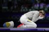Ukraine's Olga Kharlan celebrates after winning the women's individual Sabre bronze final match against South Korea's Choi Sebin during the 2024 Summer Olympics at the Grand Palais, Monday, July 29, 2024, in Paris, France. (AP Photo/Andrew Medichini)