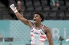 Fred Richard, of the United States, reacts after performing on the rings during the men's artistic gymnastics team finals round at Bercy Arena at the 2024 Summer Olympics, Monday, July 29, 2024, in Paris, France. (AP Photo/Abbie Parr)