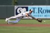 Baltimore Orioles third baseman Jordan Westburg is unable to field a single ground ball hit by Toronto Blue Jays' George Springer during the first inning in the first baseball game of a doubleheader, Monday, July 29, 2024, in Baltimore. (AP Photo/Stephanie Scarbrough)