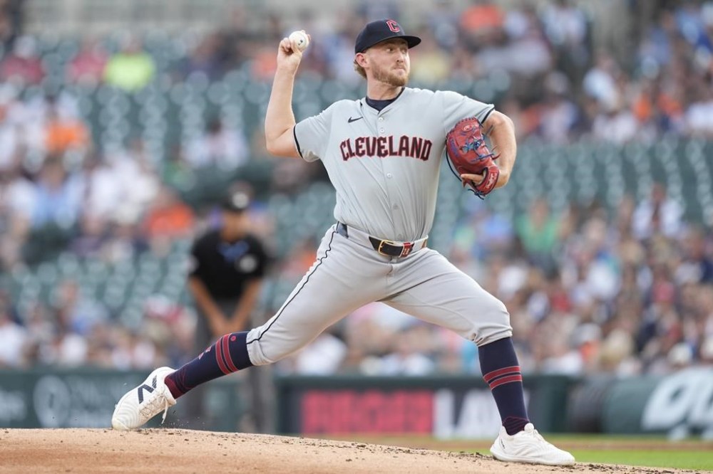 Cleveland Guardians starting pitcher Tanner Bibee throws during the first inning of a baseball game against the Detroit Tigers, Monday, July 29, 2024, in Detroit. (AP Photo/Carlos Osorio)