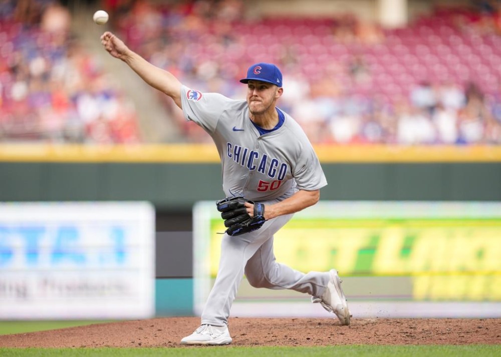 Chicago Cubs pitcher Jameson Taillon throws during the second inning of a baseball game against the Cincinnati Reds, Monday, July 29, 2024, in Cincinnati. (AP Photo/Jeff Dean)