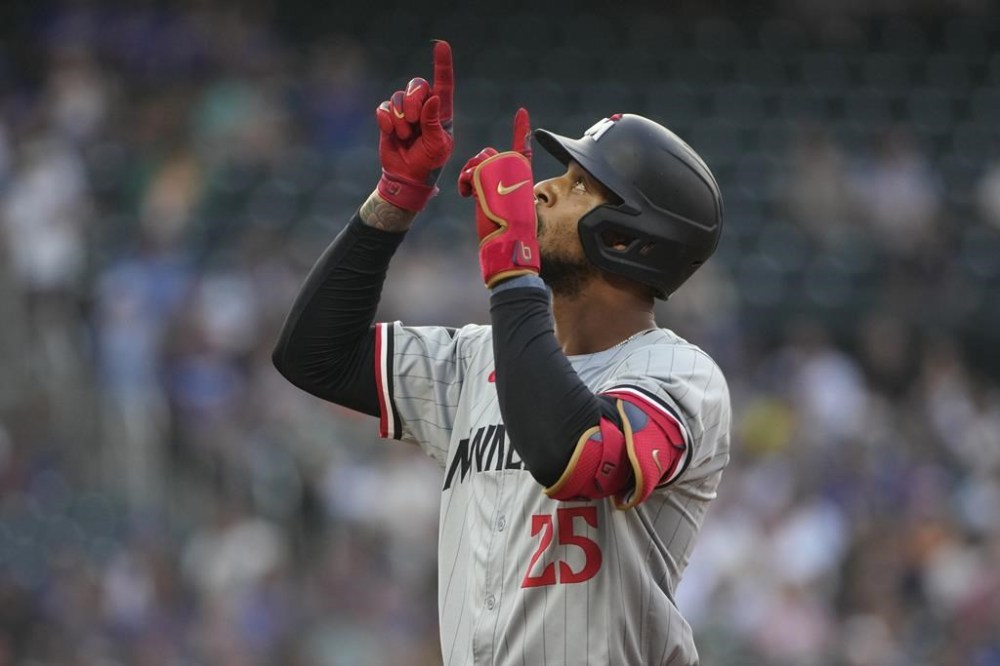 Minnesota Twins' Byron Buxton celebrates after hitting a single which led Manuel Margot to score during the first inning of a baseball game against the New York Mets, Monday, July 29, 2024, in New York. (AP Photo/Pamela Smith)