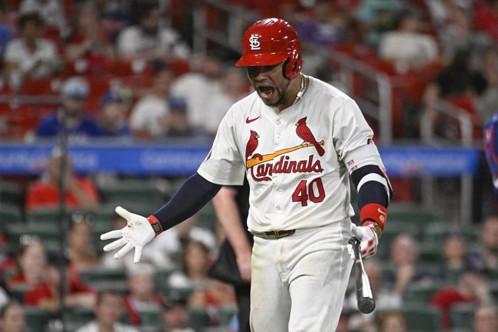 St. Louis Cardinals' Willson Contreras reacts after striking out in the eighth inning of a baseball game against the Texas Rangers, Monday, July 29, 2024, in St. Louis. (AP Photo/Joe Puetz)