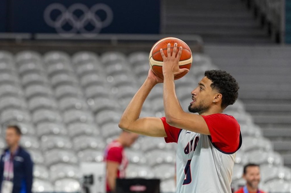 Tyrese Haliburton shoots a free throw as the United State's men's team practiced before the start of the basketball competition at the 2024 Summer Olympics, Wednesday, July 24, 2024 in Villeneuve-d'Ascq, France. (AP Photo/Michael Conroy)
