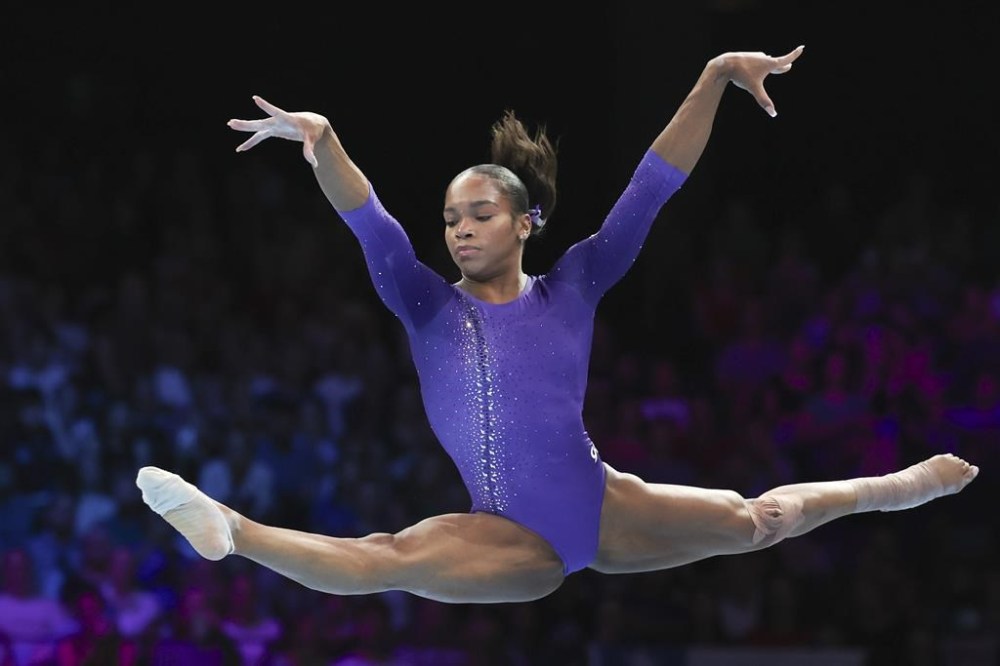 FILE - United States' Shilese Jones competes on the floor during the apparatus finals at the Artistic Gymnastics World Championships in Antwerp, Belgium, on Oct. 8, 2023. Jones announced on social media late Monday that she tore the ACL and meniscus in her left knee during the U.S. Olympic trials. The 22-year-old Jones says she plans to continue the sport with the goal of making the 2028 Games in Los Angeles. (AP Photo/Geert vanden Wijngaert, File)