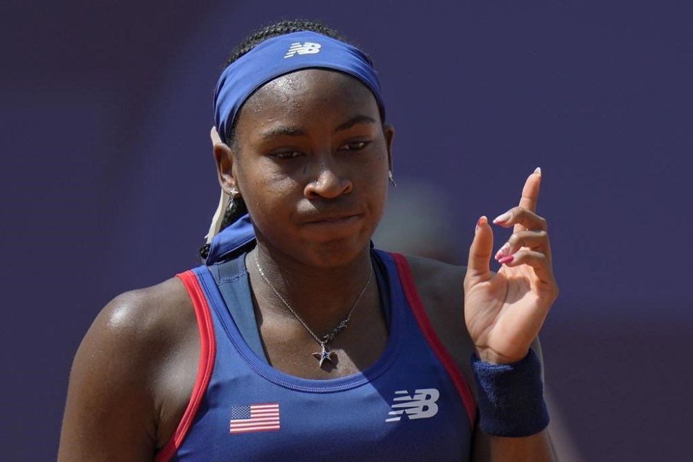 Coco Gauff of United States gestures as she plays against Donna Vekic of Croatiathe during their women's singles third round match at the Roland Garros stadium, at the 2024 Summer Olympics, Tuesday, July 30, 2024, in Paris, France. (AP Photo/Andy Wong)