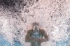 Tomoru Honda, of Japan, competes during a heat in the men's 200-meter butterfly at the 2024 Summer Olympics, Tuesday, July 30, 2024, in Nanterre, France. (AP Photo/David J. Phillip)