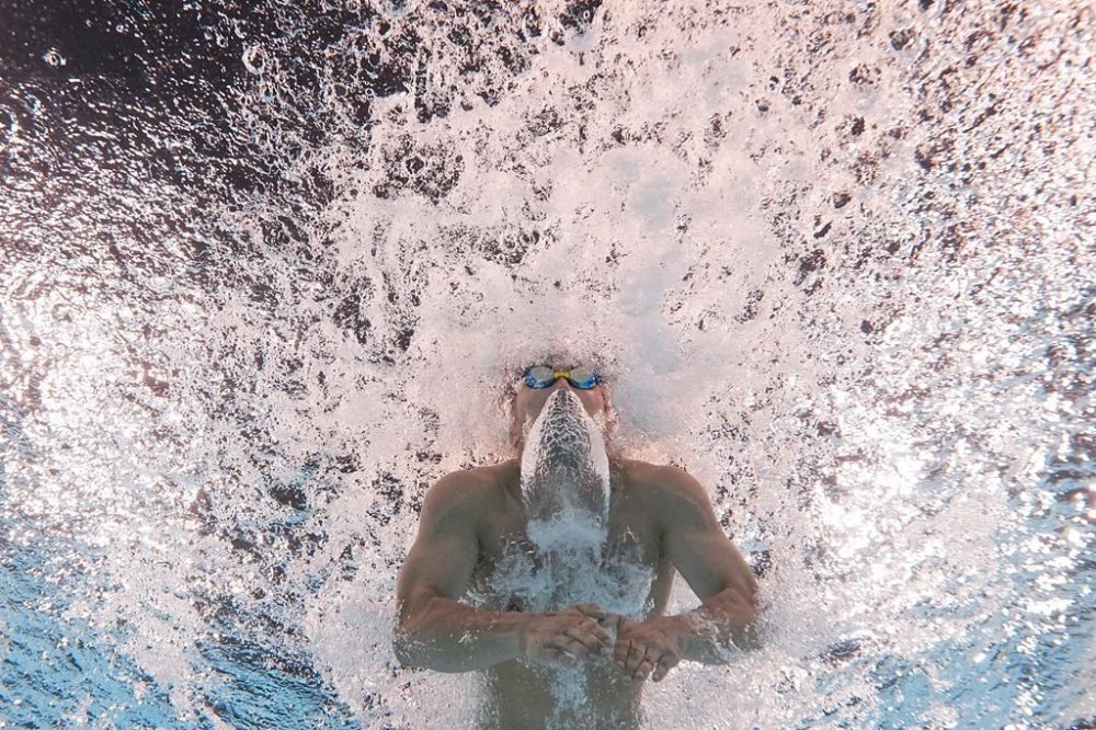 Tomoru Honda, of Japan, competes during a heat in the men's 200-meter butterfly at the 2024 Summer Olympics, Tuesday, July 30, 2024, in Nanterre, France. (AP Photo/David J. Phillip)