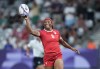 Canada back Charity Williams (6) reacts as she scores a Try against New Zealand during first half women's rugby 7s action at the 2024 Summer Olympics in Paris, France on Sunday, July 28, 2024. Canada will play for gold in women’s rugby sevens after upsetting Australia 21-12 in semifinal action at the Paris Olympics on Tuesday. THE CANADIAN PRESS/Nathan Denette