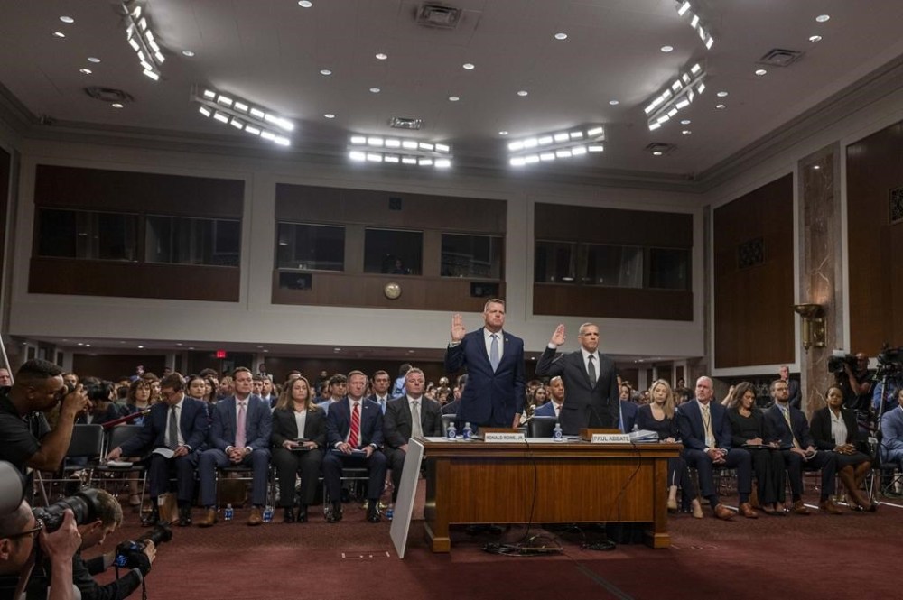 U.S. Secret Service Acting Director Ronald Rowe, left, and FBI Deputy Director Paul Abbate are sworn in before they testify before a Joint Senate Committee on Homeland Security and Governmental Affairs and Senate Committee on the Judiciary hearing examining the security failures leading to the assassination attempt on Republican presidential candidate former President Donald Trump, Tuesday, July 30, 2024 in Washington. (AP Photo/Kevin Wolf)