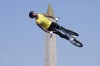 Logan Martin, of Australia, soars through the air, with the Luxor Obelisk of La Concorde square in the background, during the cycling BMX freestyle men's park qualification at the 2024 Summer Olympics, Tuesday, July 30, 2024, in Paris, France. (AP Photo/Frank Franklin II)
