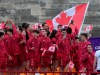 115 people are volunteering with Team Canada in Paris, greeting visitors to Canada Olympic House and supporting operations for the team and event. Canadian athletes wave from a boat on the Seine River during the opening ceremony for the 2024 Summer Olympics in Paris on Friday, July 26, 2024. THE CANADIAN PRESS/Adrian Wyld