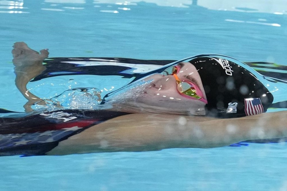 Regan Smith, of the United States, competes in the women's 100-meter backstroke final at the 2024 Summer Olympics, Tuesday, July 30, 2024, in Nanterre, France. (AP Photo/Bernat Armangue)