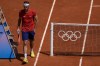 Taylor Fritz of the United States during his match against Jack Draper of Great Britain during the men's single tennis competition at the Roland Garros stadium, at the 2024 Summer Olympics, Tuesday, July 30, 2024, in Paris, France. (AP Photo/Manu Fernandez)