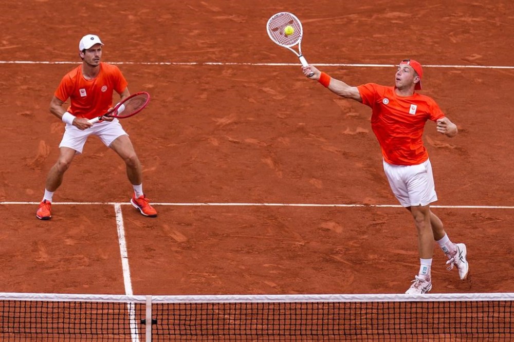 Tallon Griekspoor and Wesley Koolhof of the Netherlands compete against Rafael Nadal of Spain and Carlos Alcaraz during the men's doubles tennis competition at the Roland Garros stadium, at the 2024 Summer Olympics, Tuesday, July 30, 2024, in Paris, France. (AP Photo/Manu Fernandez)