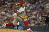 Philadelphia Phillies relief pitcher Gregory Soto throws to the Minnesota Twins in the eighth inning of a baseball game Tuesday, July 23, 2024, in Minneapolis. (AP Photo/Bruce Kluckhohn)