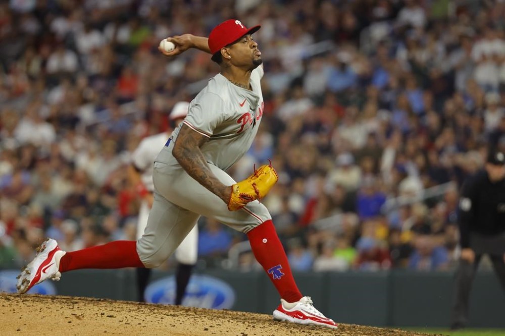 Philadelphia Phillies relief pitcher Gregory Soto throws to the Minnesota Twins in the eighth inning of a baseball game Tuesday, July 23, 2024, in Minneapolis. (AP Photo/Bruce Kluckhohn)