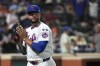New York Mets pitcher Sean Manaea reacts as he walks to the dugout after striking out Minnesota Twins' Willi Castro during the seventh inning of a baseball game, Tuesday, July 30, 2024, in New York. (AP Photo/Pamela Smith)