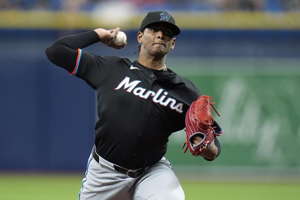 Miami Marlins starting pitcher Edward Cabrera delivers to the Tampa Bay Rays during the first inning of a baseball game Tuesday, July 30, 2024, in St. Petersburg, Fla. (AP Photo/Christopher O'Meara)