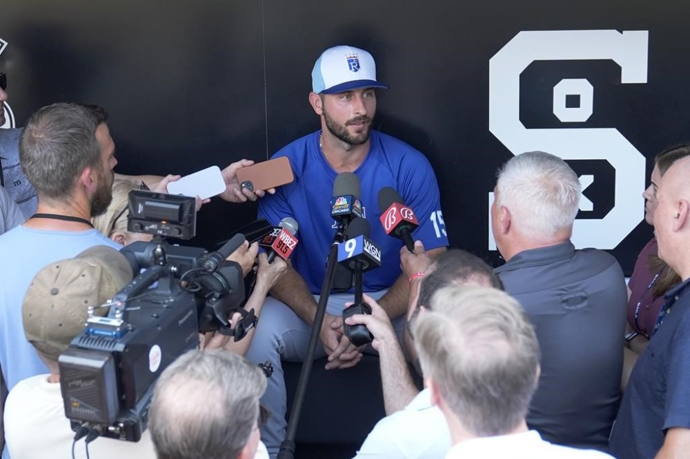Kansas City Royals' Paul DeJong talks to reporters shortly after being traded from the Chicago White Sox to the Royals before a baseball game between the two clubs Tuesday, July 30, 2024, in Chicago. (AP Photo/Charles Rex Arbogast)