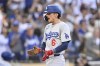 Los Angeles Dodgers second baseman Cavan Biggio (6) celebrates after hitting a solo home run during the first inning of a baseball game against the San Diego Padres, Tuesday, July 30, 2024, in San Diego. (AP Photo/Denis Poroy)