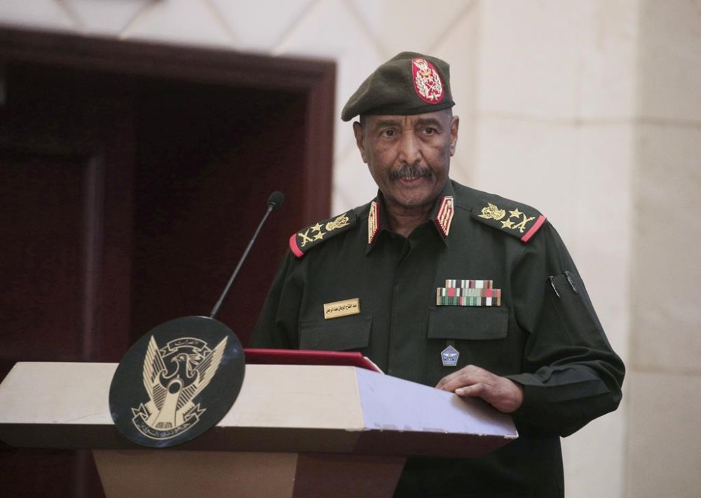 FILE - Sudan's Army chief Gen. Abdel-Fattah Burhan speaks in Khartoum, Sudan, on Dec. 5, 2022. Sudan’s military said its top commander, Gen. Abdel-Fattah Burhan, survived a drone attack on a military graduation ceremony that killed five people in the country’s east. (AP Photo/Marwan Ali, File)