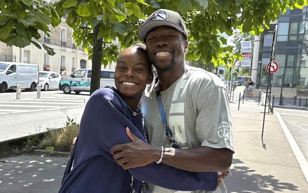 Jasmine Moore and her boyfriend Joseph Fahnbulleh pose near the athletes village at the 2024 Summer Olympics, in Paris, France, July 30, 2024. Moore is the first U.S. woman to qualify for the Olympics in both the high jump and triple jump. (AP Photo/Eddie Pells)