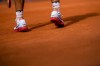 Rafael Nadal of Spain prepares to serve against Marton Fucsovics of Hungary during the men's singles tennis competition, at the 2024 Summer Olympics, Sunday, July 28, 2024, in Paris, France. (AP Photo/Manu Fernandez)