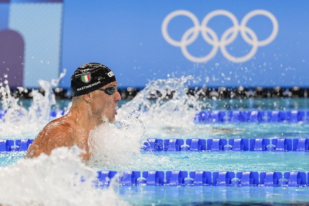 Nicolo Martinenghi, of Italy, competes in the men's 100-meter breaststroke final at the 2024 Summer Olympics, Sunday, July 28, 2024, in Nanterre, France. (AP Photo/Martin Meissner)