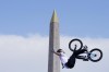 Gil Jose Torres, of Argentina, performs a trick, with the Luxor Obelisk of La Concorde square in the background, during the cycling BMX freestyle women's park final at the 2024 Summer Olympics, Wednesday, July 31, 2024, in Paris, France. (AP Photo/Frank Franklin II)