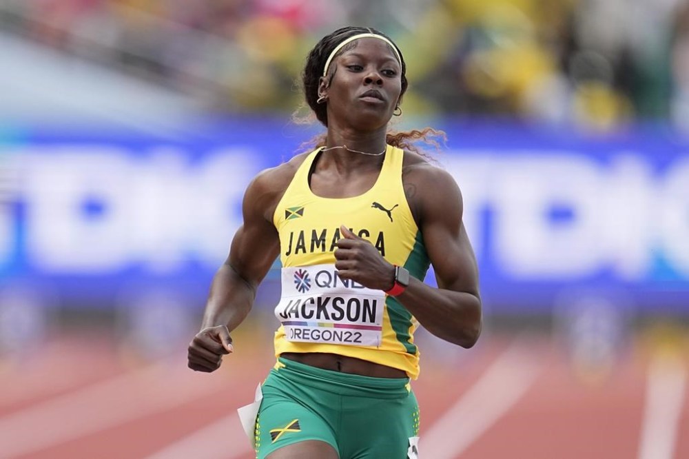 FILE - Shericka Jackson, of Jamaica, wins a heat in the women's 100-meter run at the World Athletics Championships, July 16, 2022, in Eugene, Ore. (AP Photo/Ashley Landis, File)