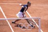 Anna Karolina Schmiedlova of Slovakia returns the ball against Barbora Krejcikova of Czech Republic during the women's single tennis competition at the Roland Garros stadium, at the 2024 Summer Olympics, Wednesday, July 31, 2024, in Paris, France. (AP Photo/Manu Fernandez)