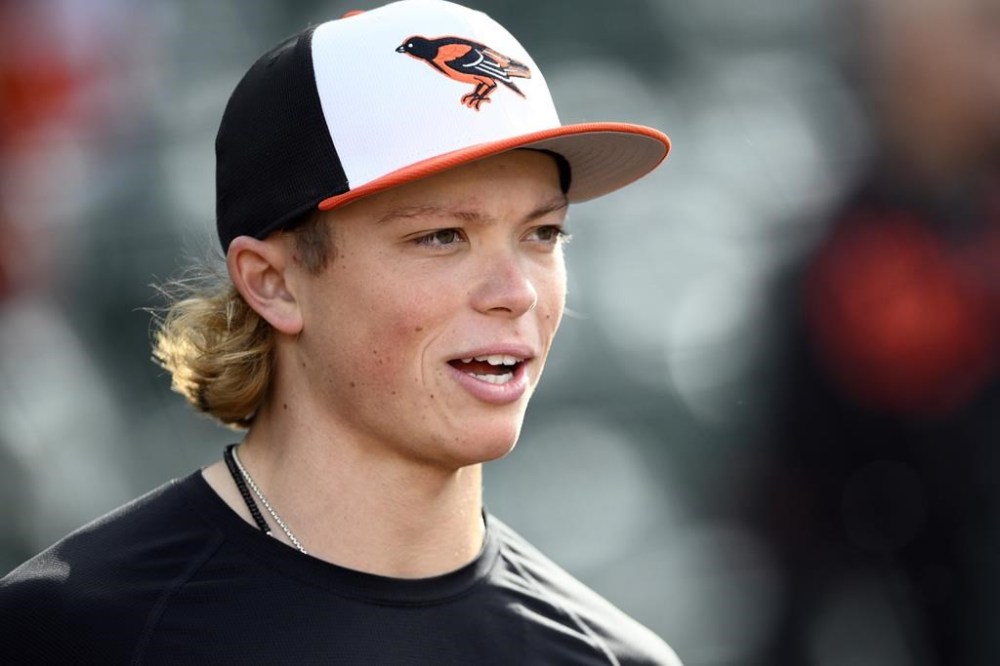 FILE - Baltimore Orioles' Jackson Holliday works out before a baseball game against the Milwaukee Brewers, Friday, April 12, 2024, in Baltimore. The Baltimore Orioles recalled the top-ranked prospect from Triple-A Norfolk on Wednesday, July 31, 2024, giving the infielder his second shot at the major leagues. (AP Photo/Nick Wass, File)