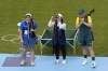 Guatemala's Adriana Oliva Ruano, center, Italy's Silvana Maria Stanco, left, and Australia's Penny Smith celebrate after winning the first, second and third positions in the Trap women's final at the 2024 Summer Olympics, Wednesday, July 31, 2024, in Chateauroux, France. (AP Photo/Manish Swarup)